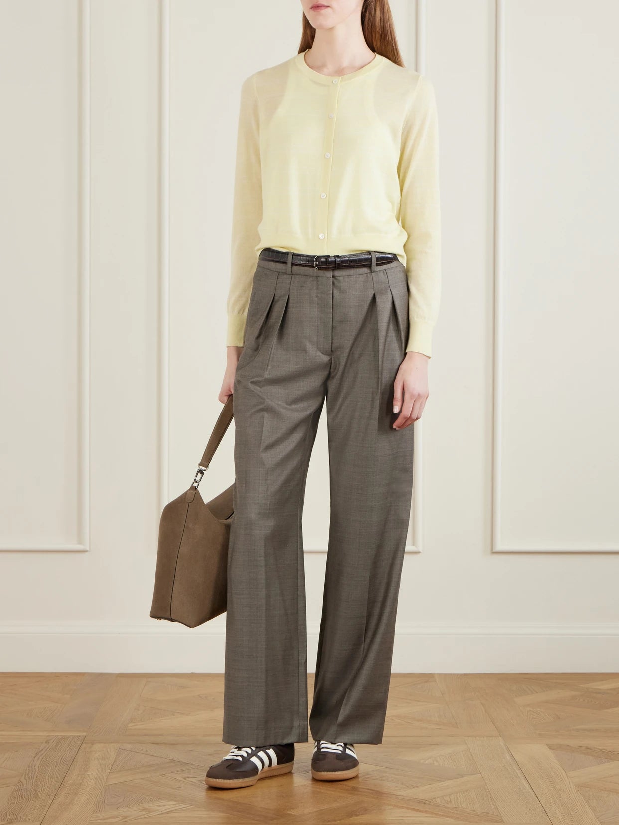 Image of a model wearing Outerwear. Product name - Caspian Cashmere Cardigan in Yellow colour by brand - Arch4