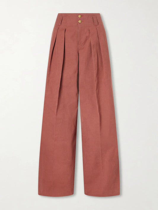 Image of a model wearing Pants. Product name - High-rise Cotton Wide-leg Pants in Red colour by brand - Chloé