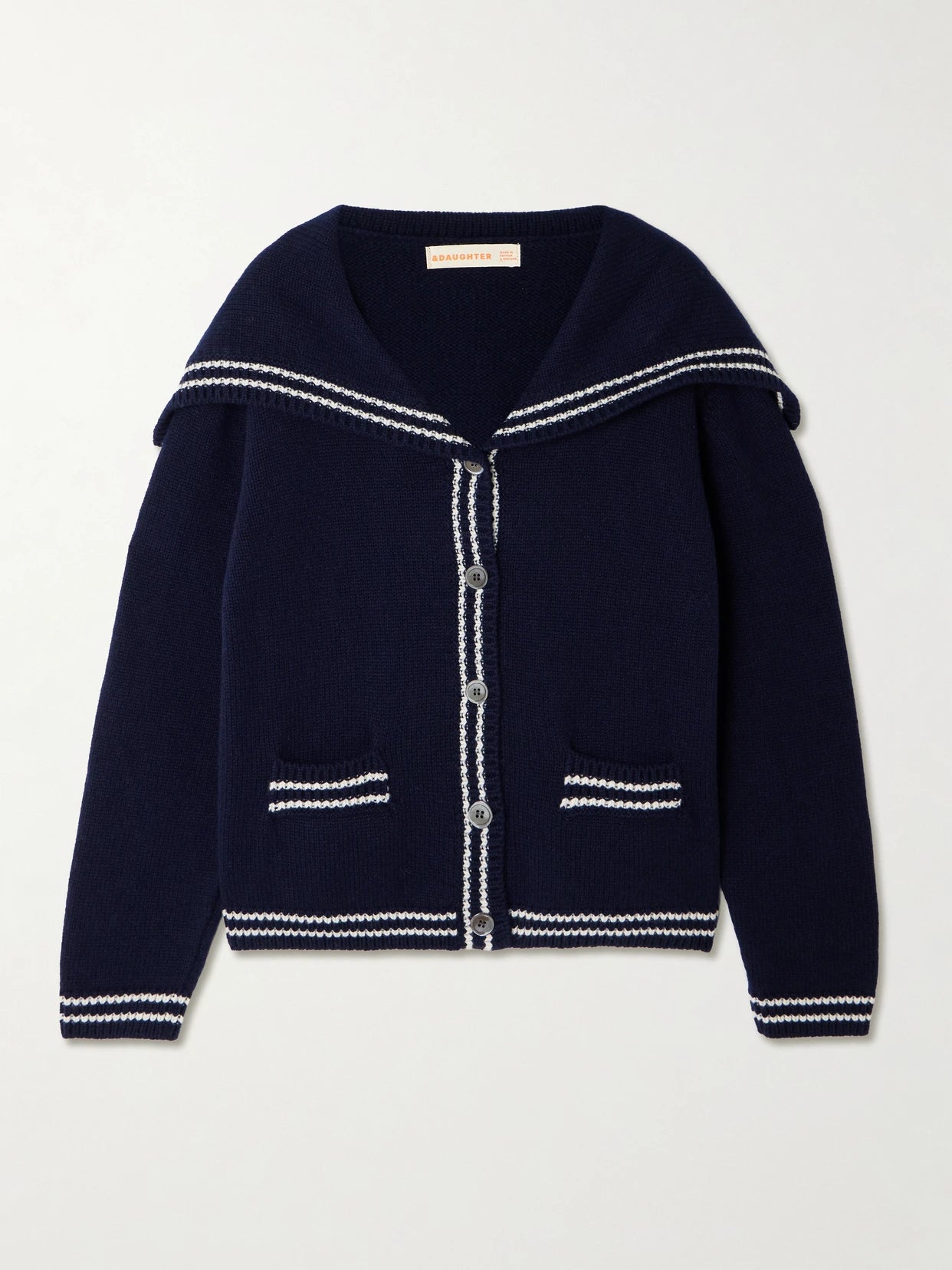 Image of a model wearing Outerwear. Product name - Saoirse Sailor Striped Wool Cardigan in Navy colour by brand - &Daughter