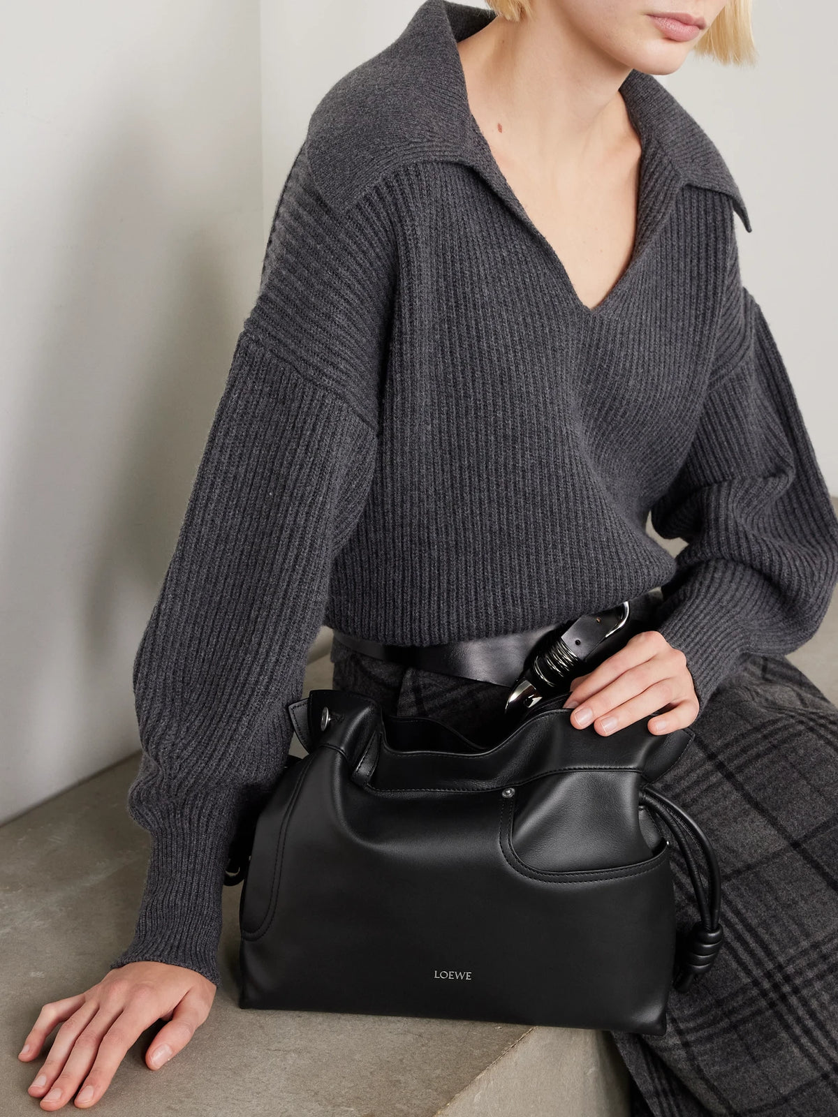 Image of Bags. Product name - Flamenco Panta Medium Leather Clutch in Black colour by brand - LOEWE