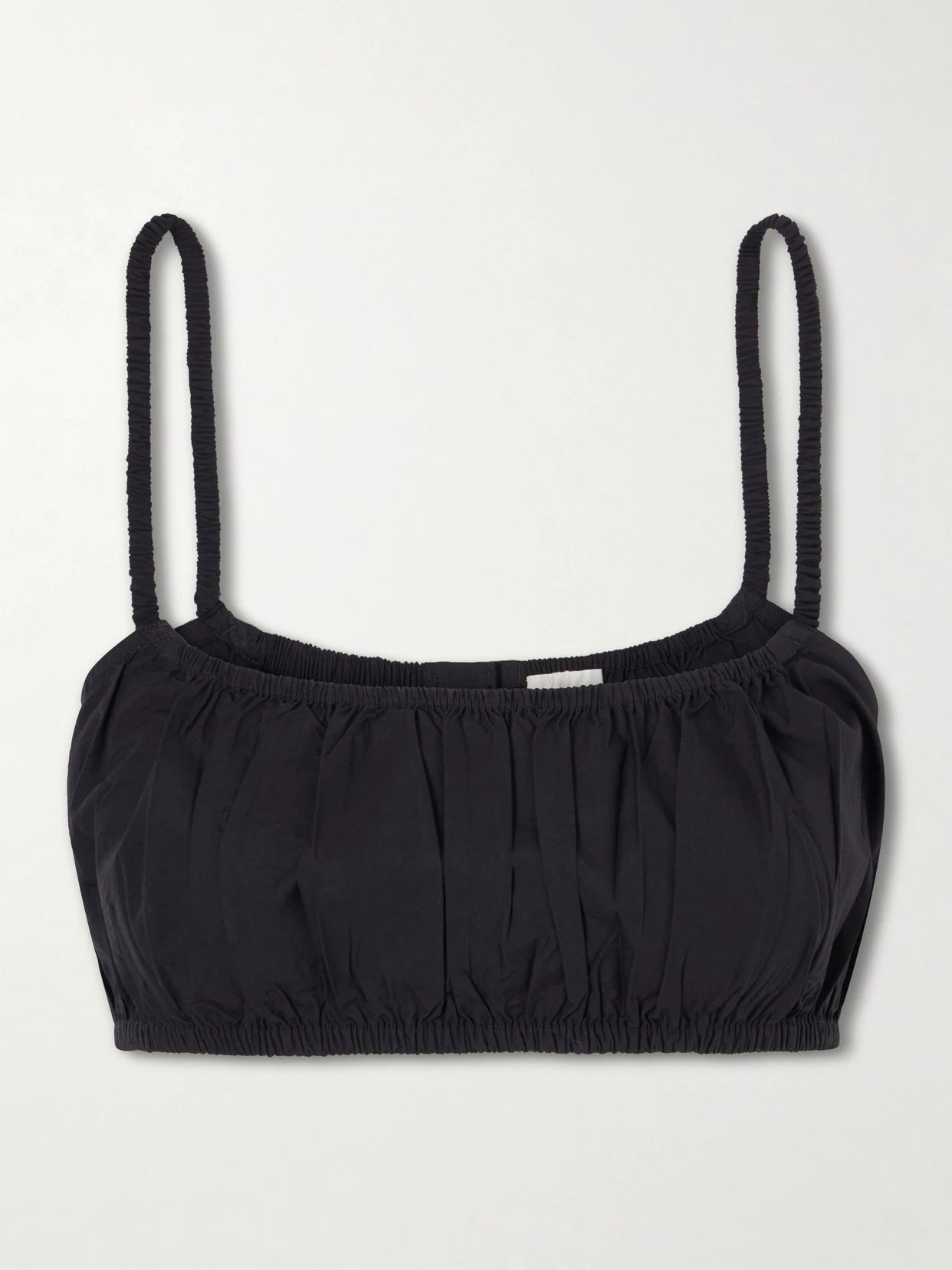 Image of a model wearing Tops. Product name - Bea Shirred Cotton-poplin Bandeau Tank in Black colour by brand - Suzie Kondi