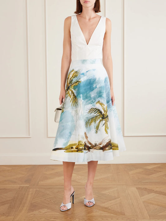 Image of a model wearing Skirts. Product name - All Over Beach Printed Cotton-blend Poplin Midi Skirt in Light blue colour by brand - Oscar de la Renta