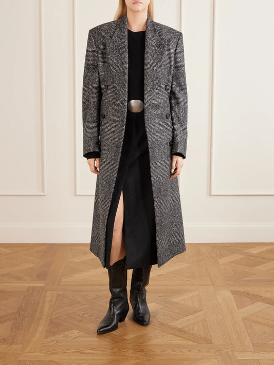 Image of a model wearing Outerwear. Product name - Sona Cashmere Sweater in Black colour by brand - Nili Lotan