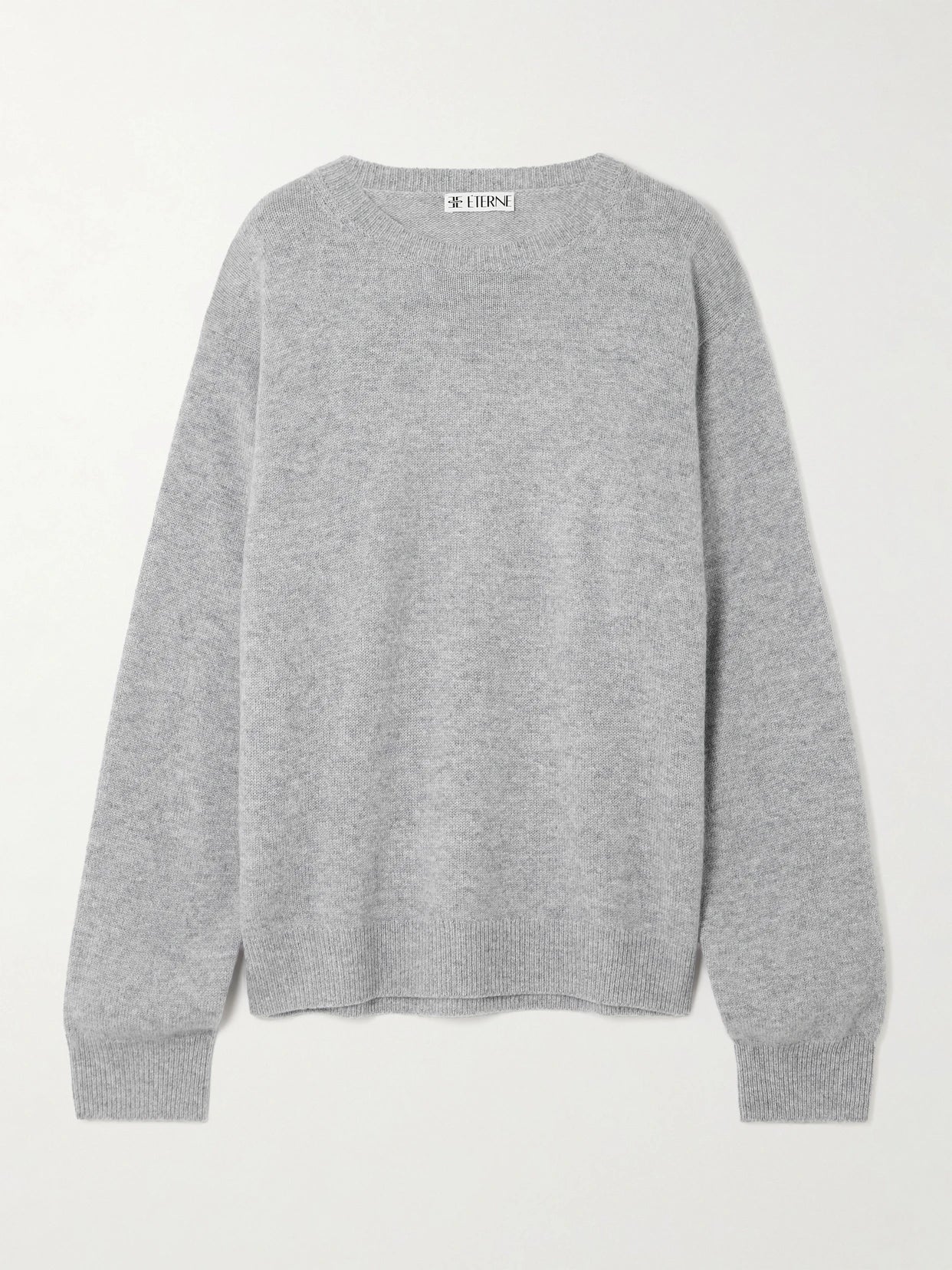 Image of a model wearing Outerwear. Product name - James Cashmere Sweater in Gray colour by brand - ÉTERNE