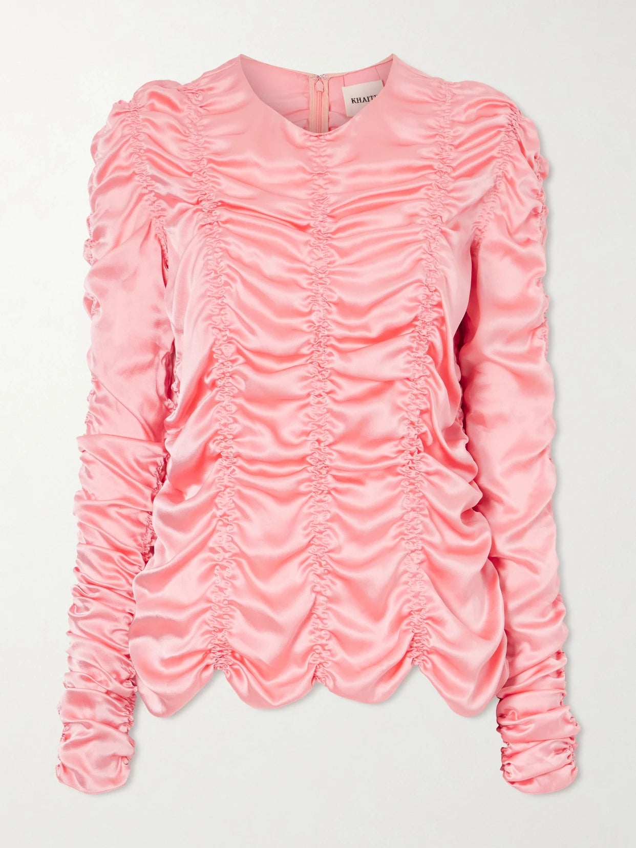 Image of a model wearing Tops. Product name - Rory Ruched Silk Satin Top in Pink colour by brand - KHAITE
