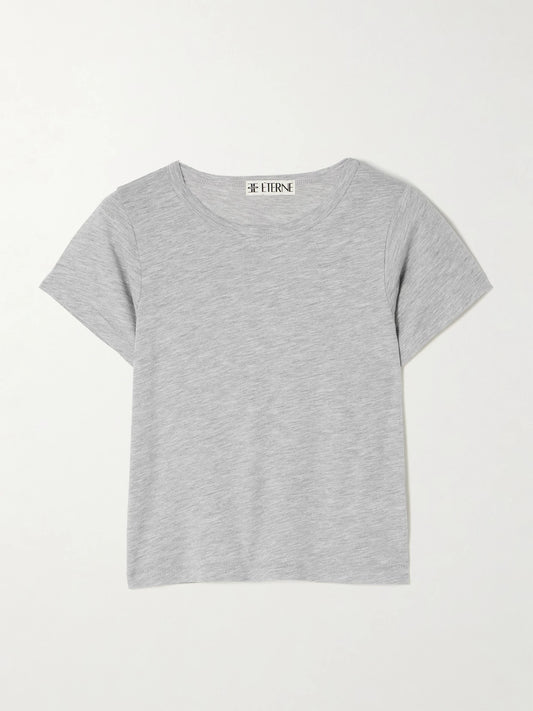Image of a model wearing Tops. Product name - Baby Tee Cropped Cotton And Modal-blend Jersey T-shirt in Gray colour by brand - ÉTERNE