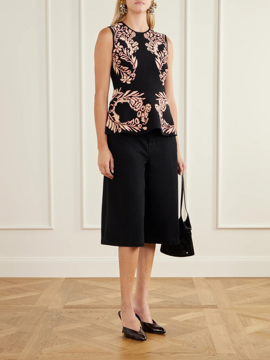 Image of a model wearing Tops. Product name - Nadira Floral-jacquard Top in Black colour by brand - Ulla Johnson