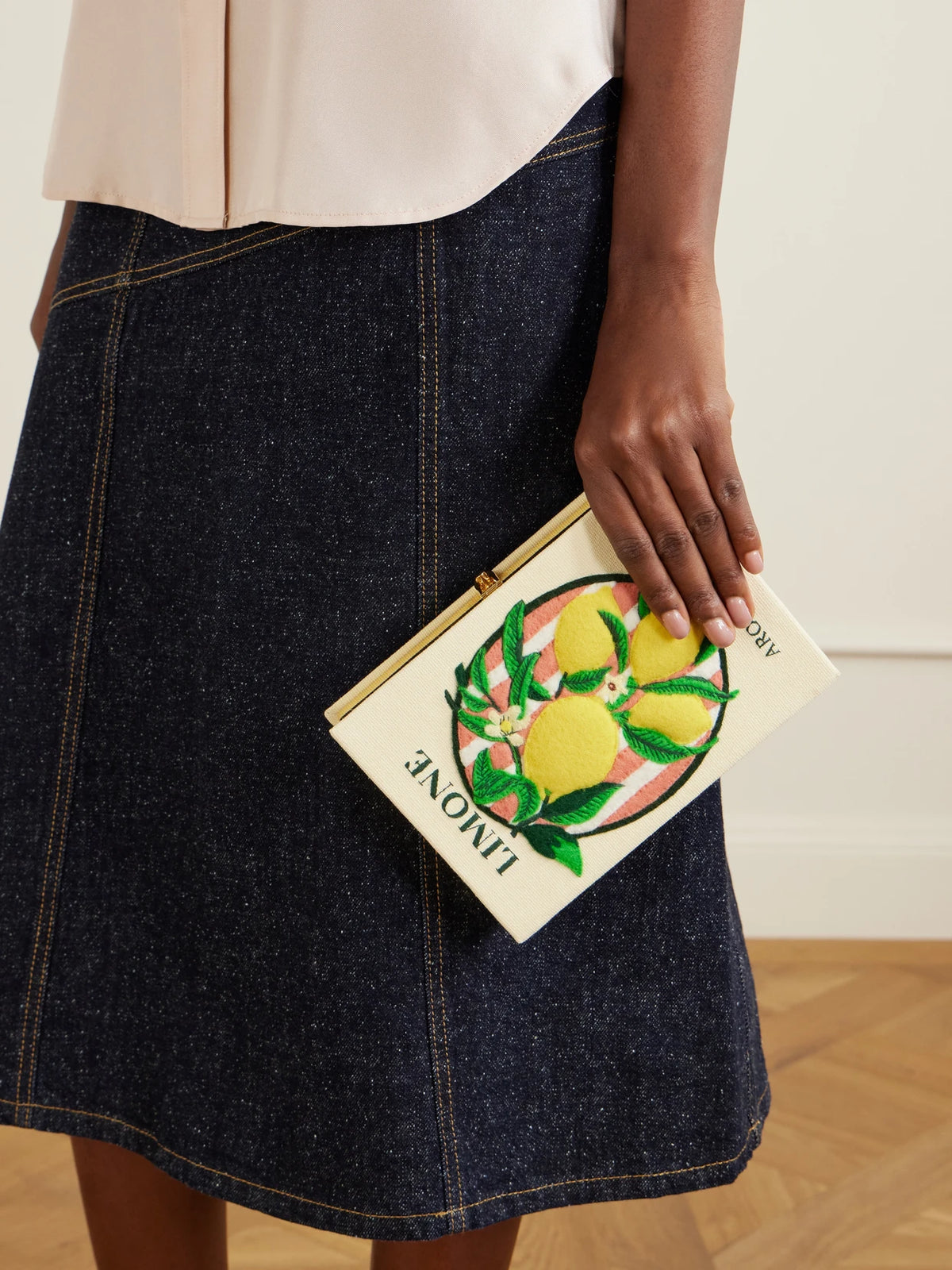 Image of Bags. Product name - Aroma D'italia Appliquéd Embroidered Canvas Clutch in Yellow colour by brand - Olympia Le-Tan