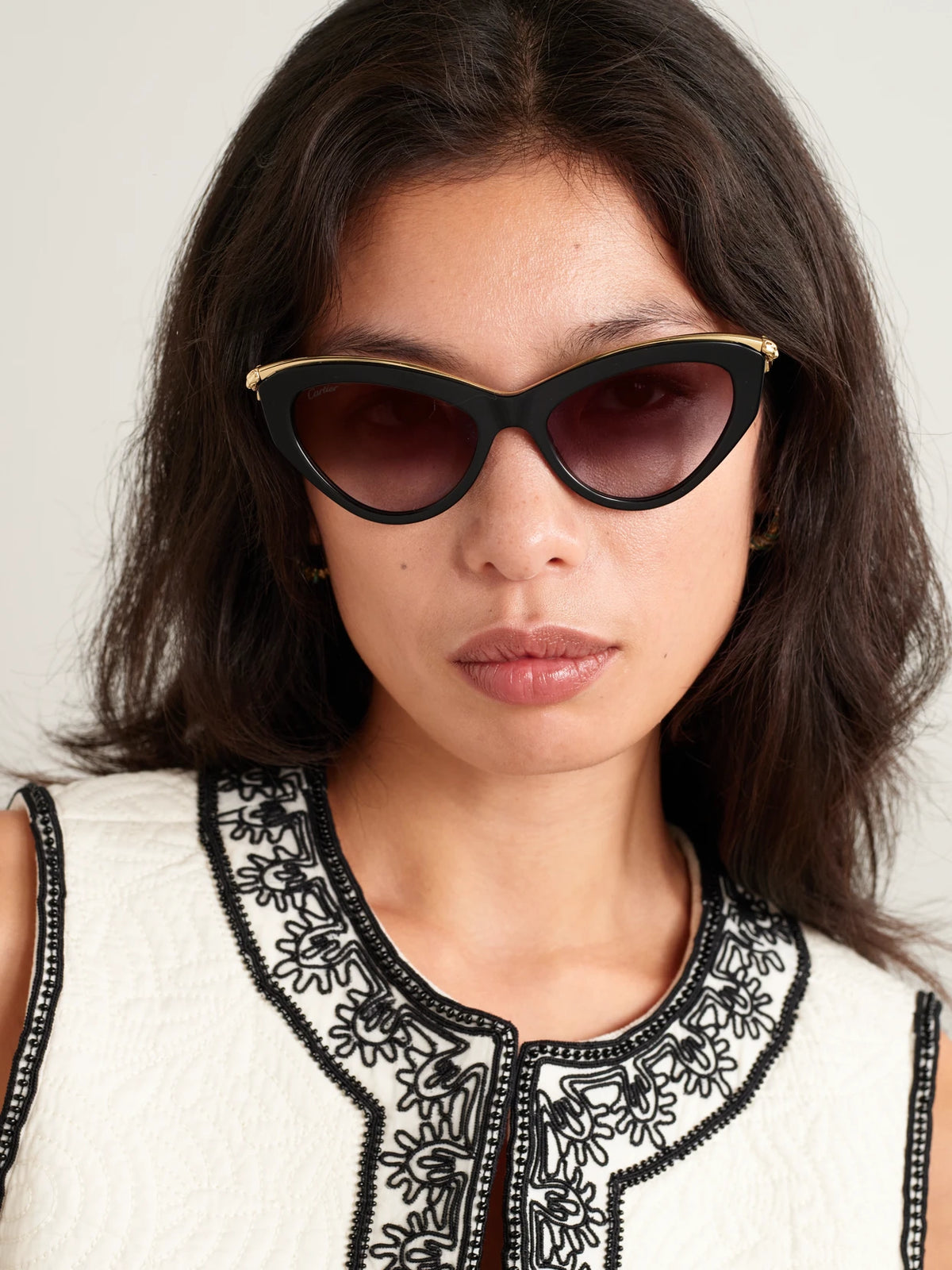 Image of Sunglasses. Product name - Panthère Classic Cat-eye Acetate And Gold-tone Sunglasses in Black colour by brand - Cartier Eyewear