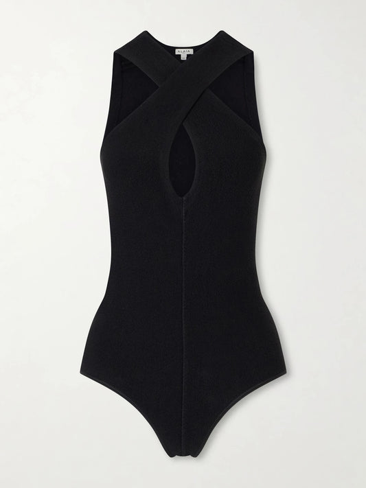 Image of a model wearing Tops. Product name - Cross Body Compact Bodysuit in Black colour by brand - Alaïa
