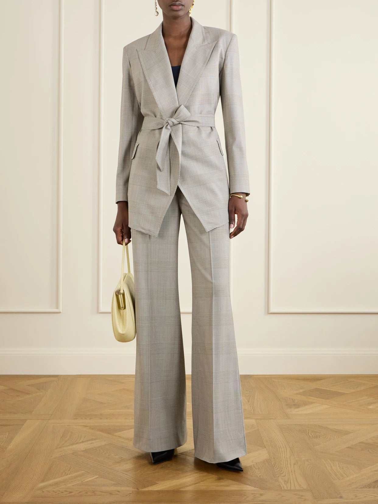 Image of a model wearing Pants. Product name - Logo-print Checked Wool Wide-leg Pants in Gray colour by brand - Max Mara