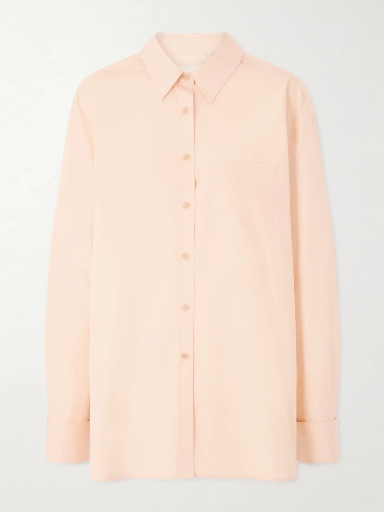 Image of a model wearing Tops. Product name - Newton Cotton-poplin Shirt in Peach colour by brand - KHAITE