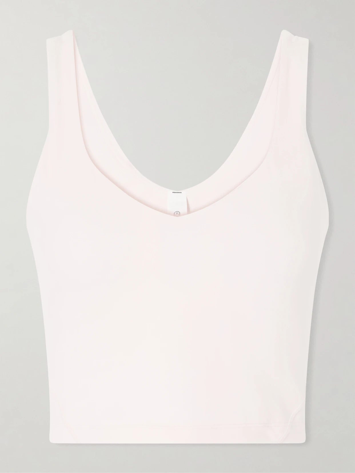 Image of a model wearing Tops. Product name - Align Stretch-jersey Tank in Baby pink colour by brand - lululemon