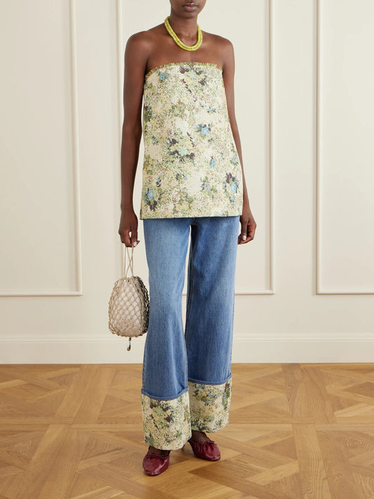 Image of a model wearing Tops. Product name - Whitney Strapless Floral-jacquard Bustier Top in Multi colour by brand - ALÉMAIS
