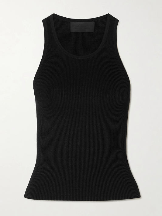 Image of a model wearing Tops. Product name - Lottie Ribbed Silk Tank in Black colour by brand - Nili Lotan