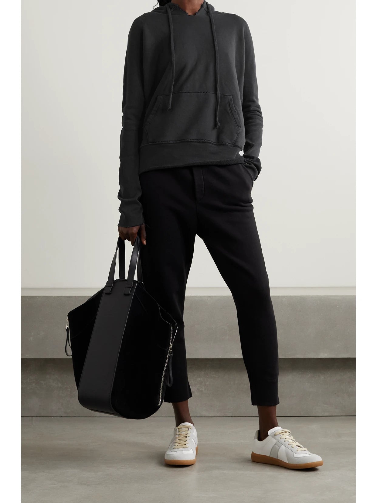 Image of Sleepwear & Loungewear. Product name - Janie Distressed Cotton-jersey Hoodie in Black colour by brand - Nili Lotan