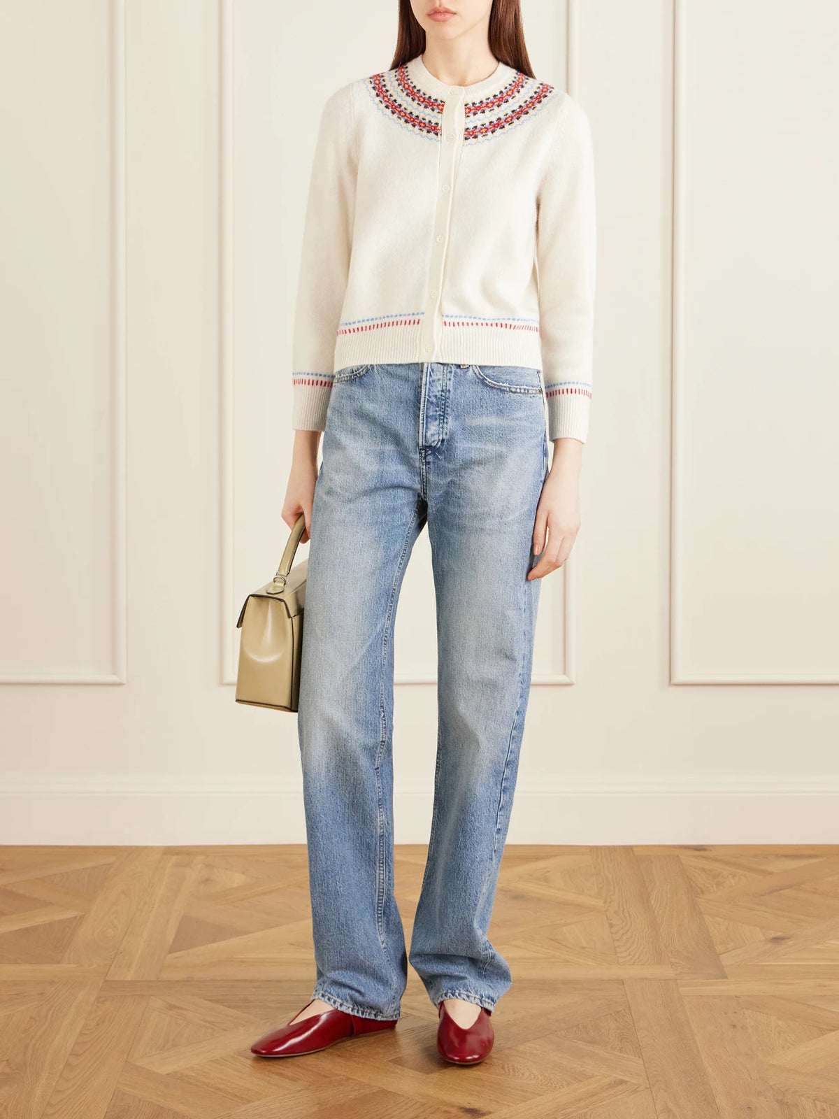 Image of a model wearing Outerwear. Product name - Olympe Embroidered Wool And Cashmere-blend Cardigan in Ivory colour by brand - DÔEN