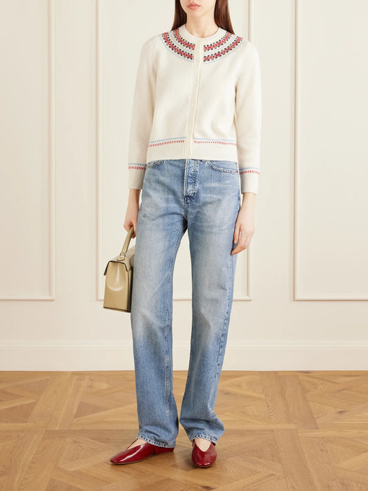 Image of a model wearing Outerwear. Product name - Olympe Embroidered Wool And Cashmere-blend Cardigan in Ivory colour by brand - DÔEN