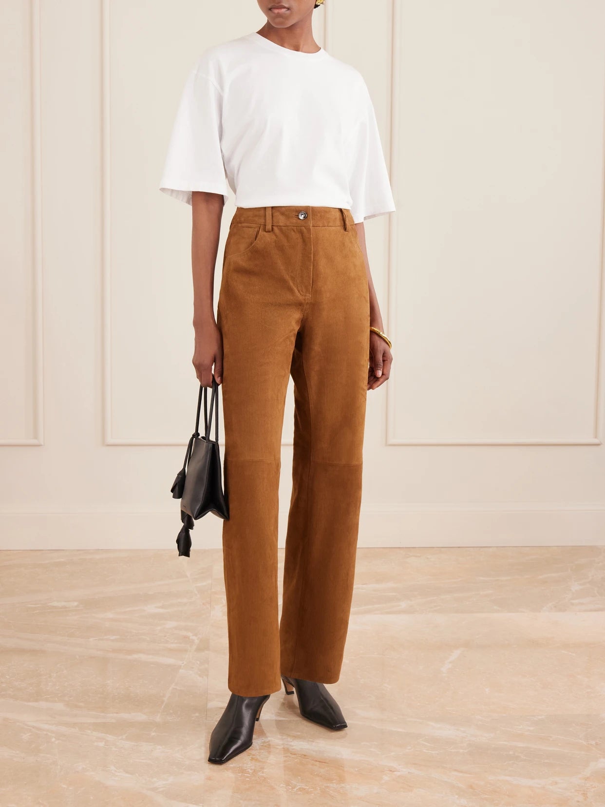 Image of a model wearing Pants. Product name - Suede Corduroy Straight-leg Pants in Light brown colour by brand - Magda Butrym