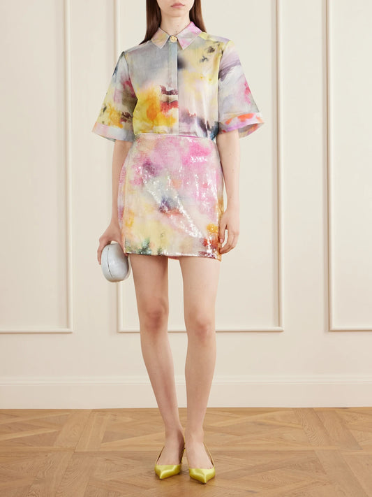 Image of a model wearing Tops. Product name - Adina Printed Lyocell-blend Shirt in Pink colour by brand - Aje