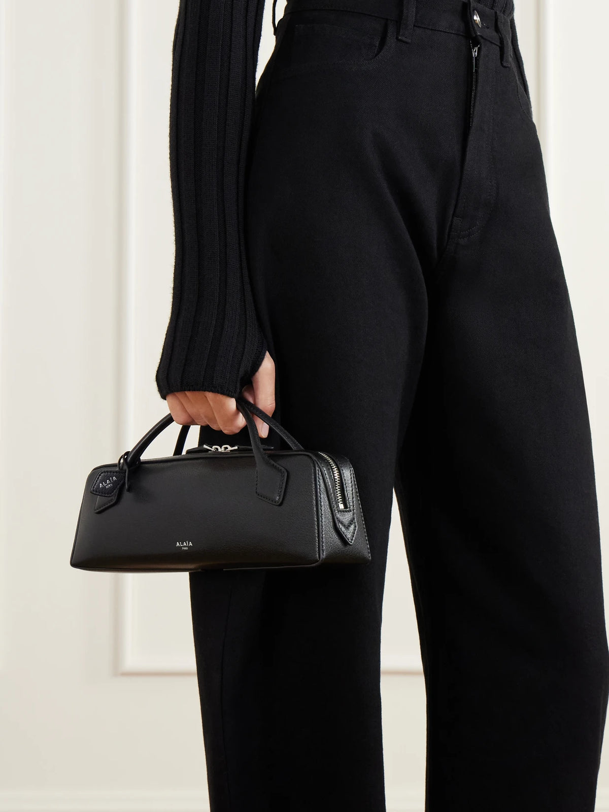 Image of Bags. Product name - Le Teckel Textured-leather Tote in Black colour by brand - Alaïa