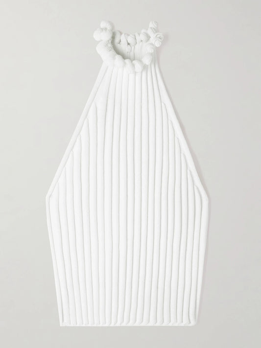 Image of a model wearing Tops. Product name - Cropped Ribbed-knit Top in White colour by brand - Alaïa