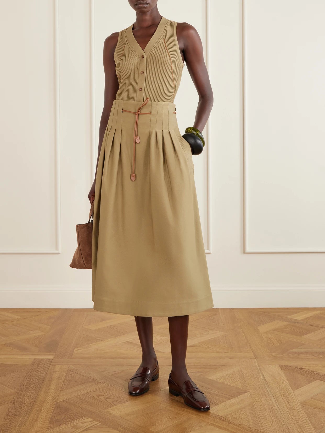 Image of a model wearing Tops. Product name - Lace-detailed Ribbed Cotton-blend Vest in Taupe colour by brand - Max Mara