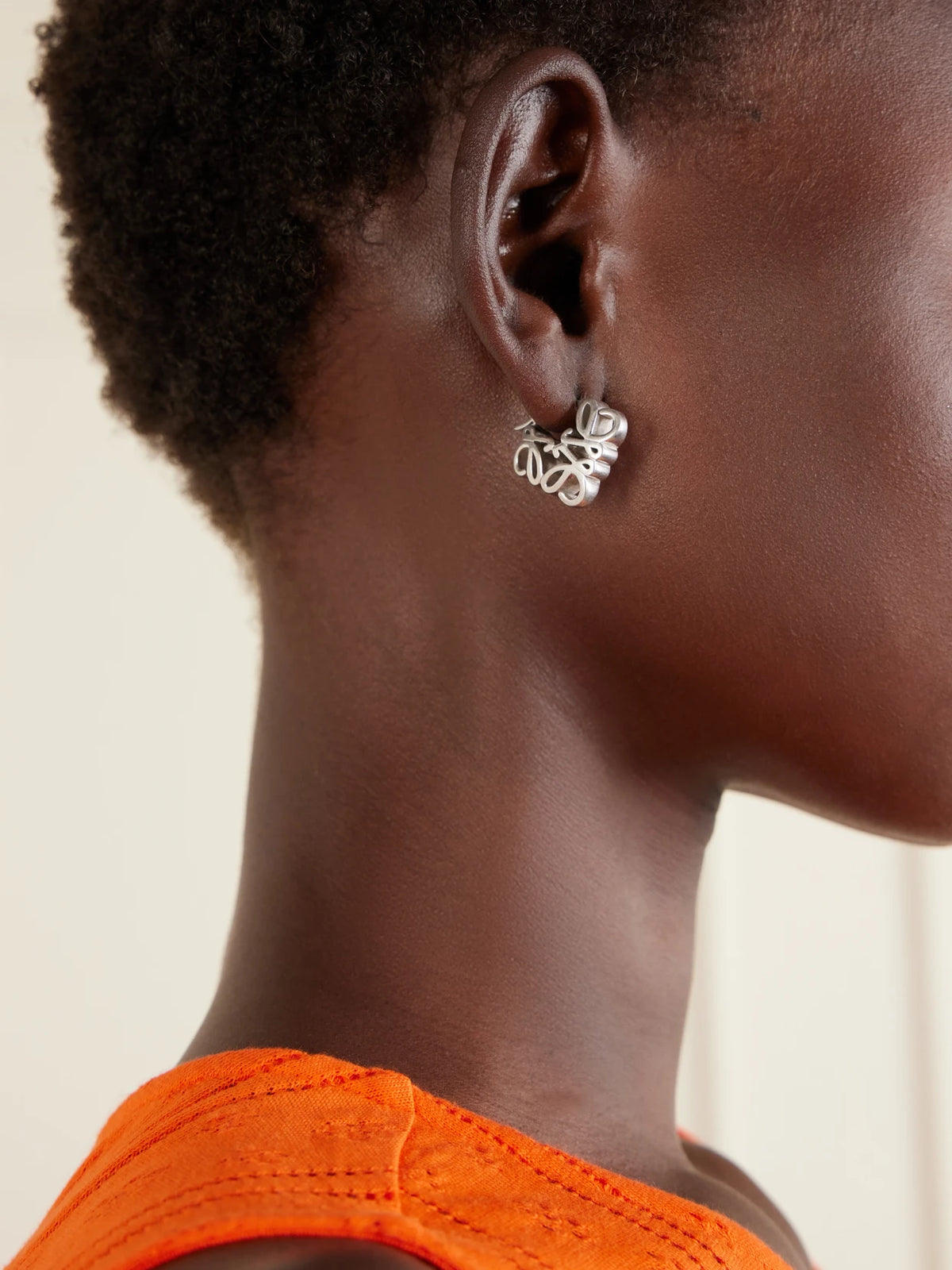 Image of Earrings. Product name - Anagram Bombé Sterling Silver Earrings in Multi colour by brand - LOEWE