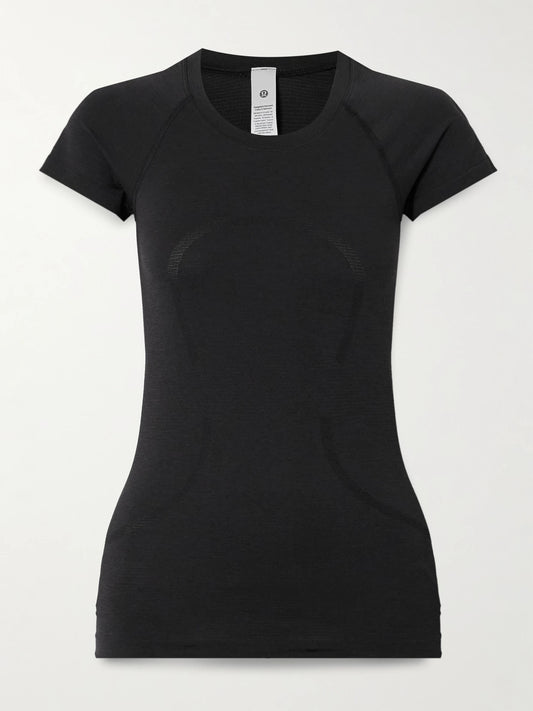 Image of a model wearing Shorts. Product name - Swiftly Tech Short-sleeve Shirt 2.0 - Hip Length in Black colour by brand - lululemon
