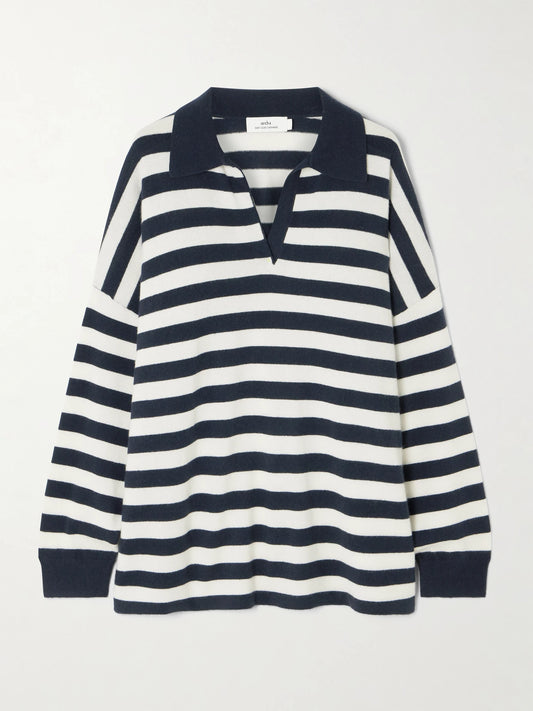 Image of a model wearing Outerwear. Product name - Victoria Oversized Striped Cashmere Polo Sweater in Navy colour by brand - Arch4