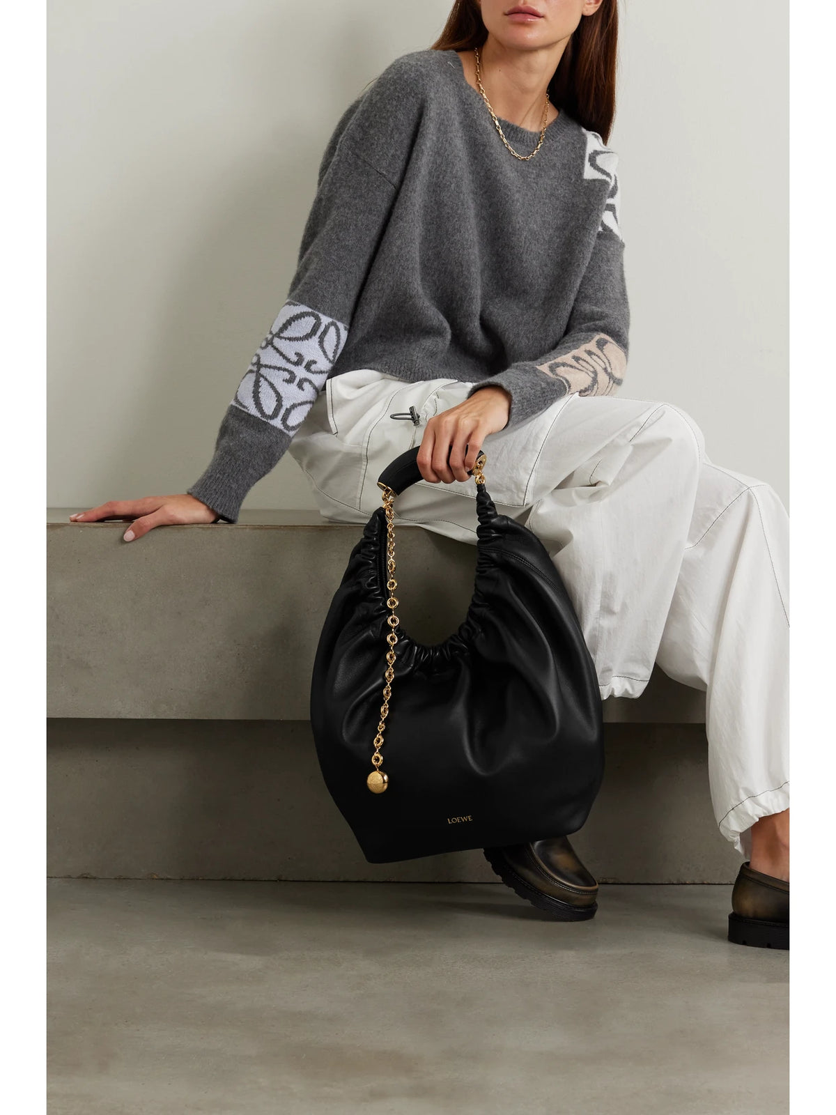 Image of Bags. Product name - Squeeze Medium Chain-embellished Gathered Leather Shoulder Bag in Black colour by brand - LOEWE