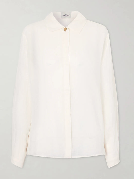 Image of a model wearing Tops. Product name - Sanbu Linen Shirt in White colour by brand - Le Kasha