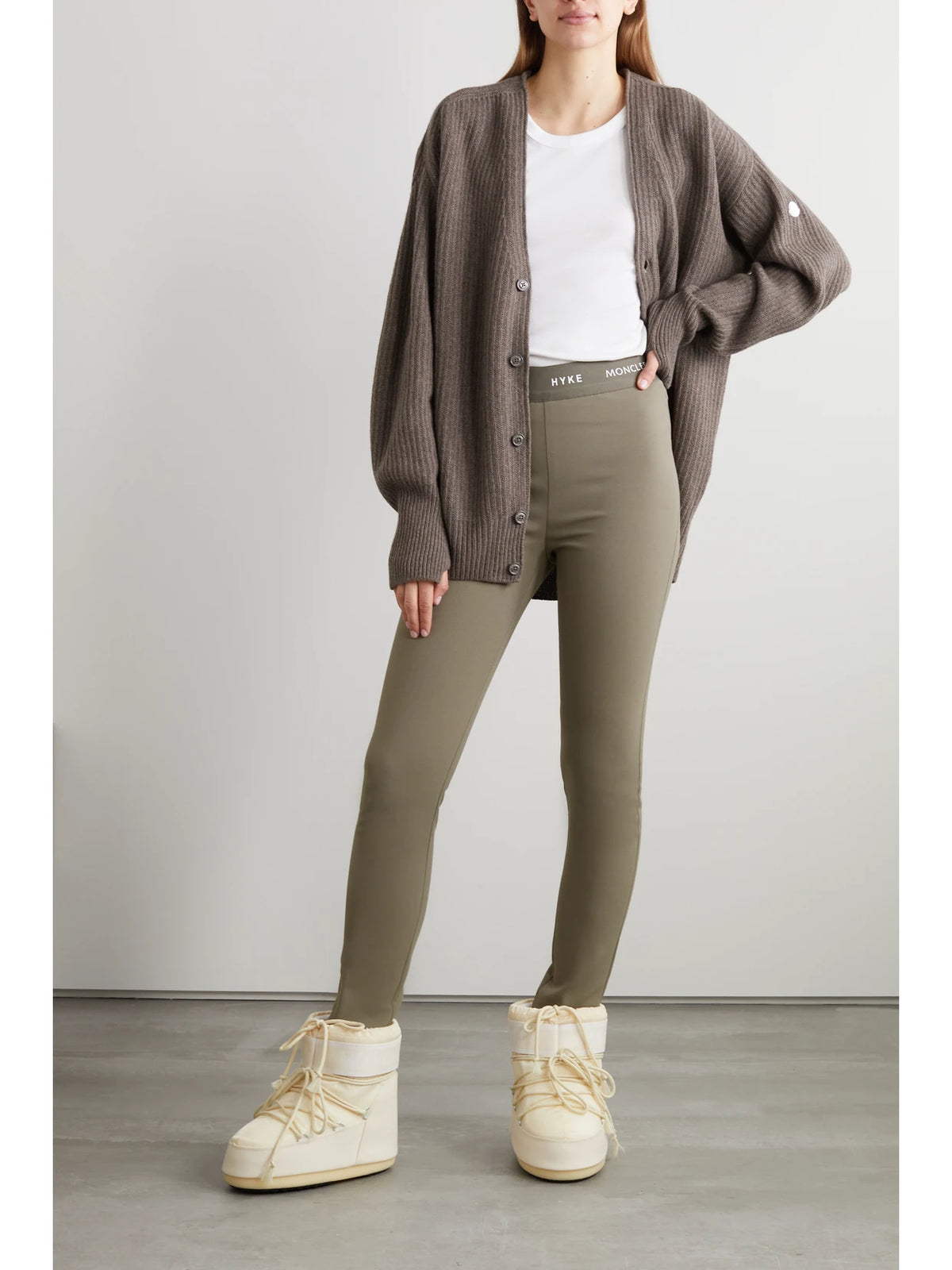 Image of a model wearing Pants. Product name - + Hyke Tech-jersey Leggings in Taupe colour by brand - Moncler Genius