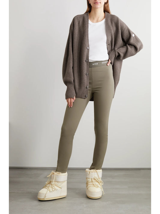 Image of a model wearing Pants. Product name - + Hyke Tech-jersey Leggings in Taupe colour by brand - Moncler Genius