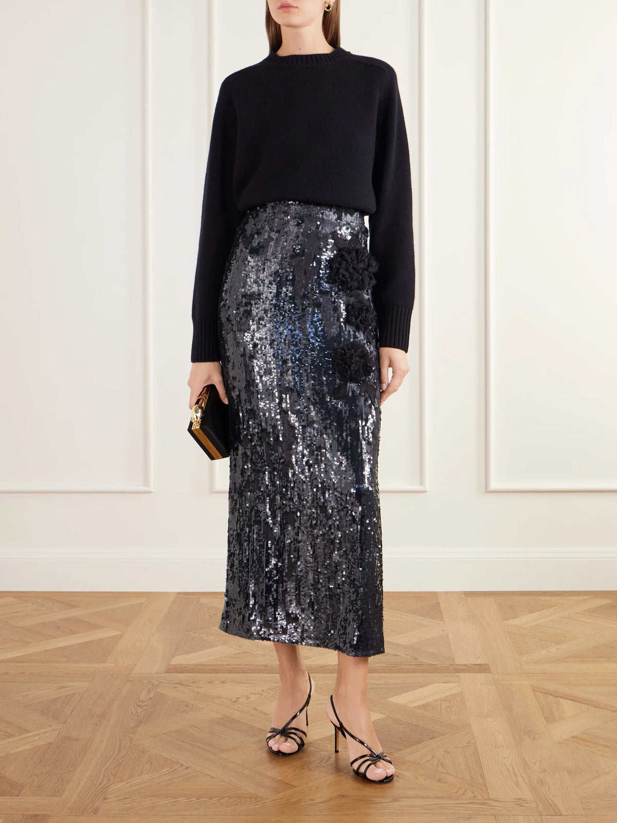 Image of a model wearing Skirts. Product name - Floral-appliqué Sequined Crepe De Chine Midi Skirt in Green colour by brand - Erdem