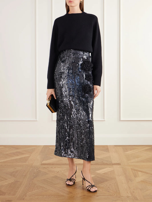 Image of a model wearing Skirts. Product name - Floral-appliqué Sequined Crepe De Chine Midi Skirt in Green colour by brand - Erdem