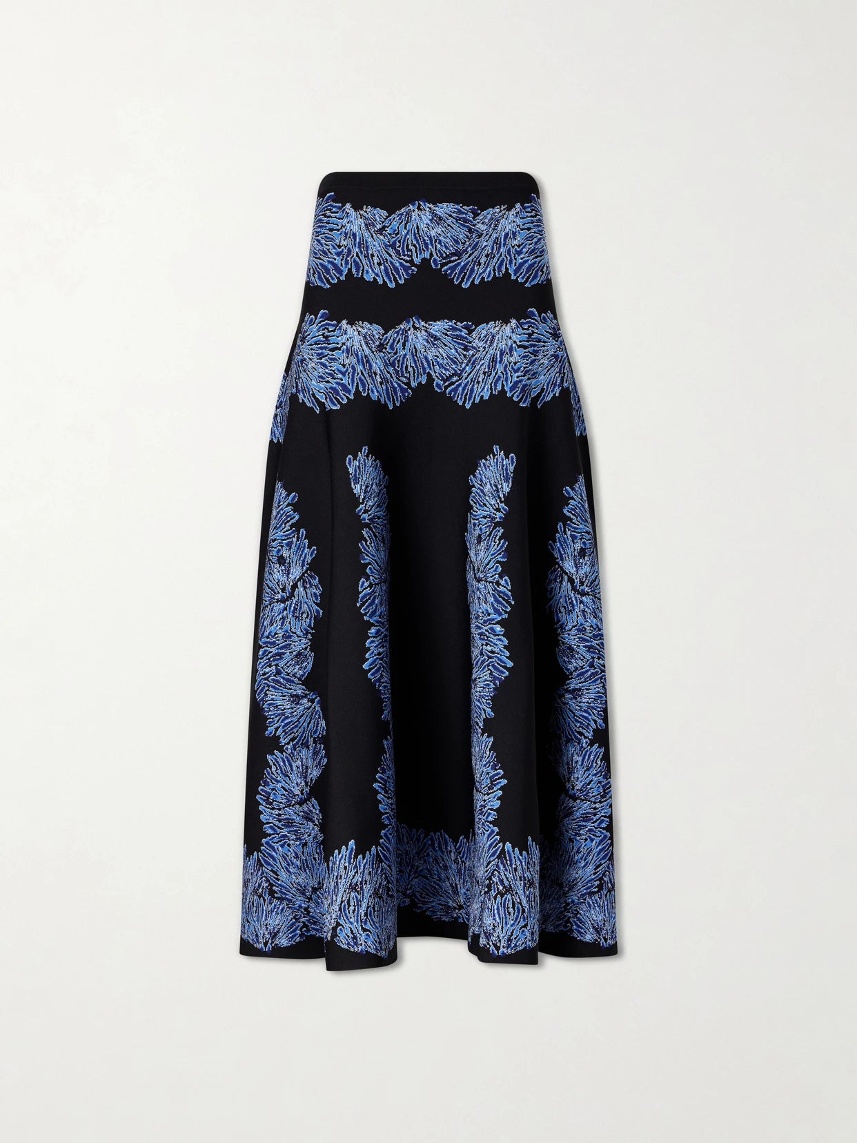 Image of a model wearing Skirts. Product name - Alessia Jacquard-knit Midi Skirt in Navy colour by brand - Ulla Johnson