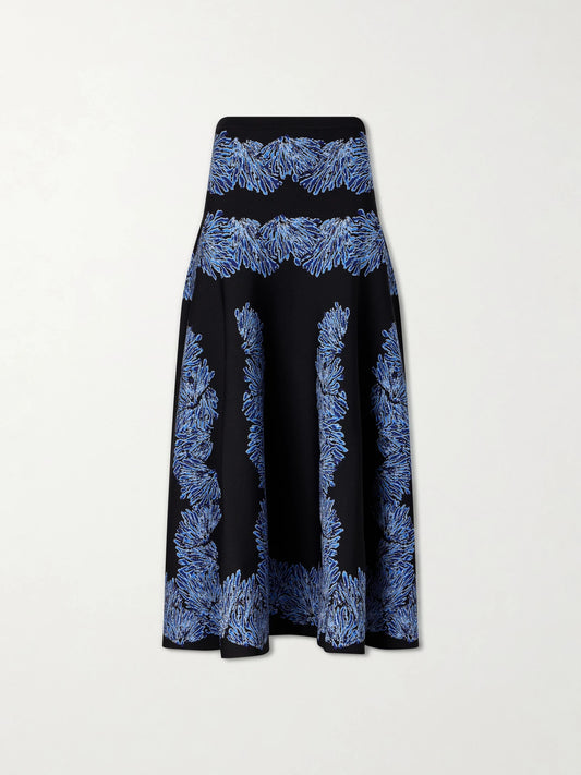 Image of a model wearing Skirts. Product name - Alessia Jacquard-knit Midi Skirt in Navy colour by brand - Ulla Johnson