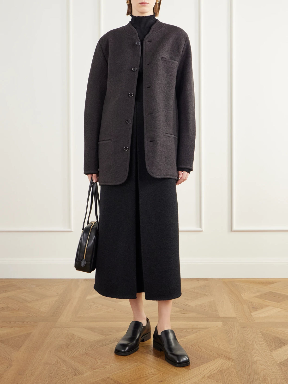 Image of a model wearing Skirts. Product name - Walker Felted Wool-fleece Wrap Midi Skirt in Dark brown colour by brand - RIER