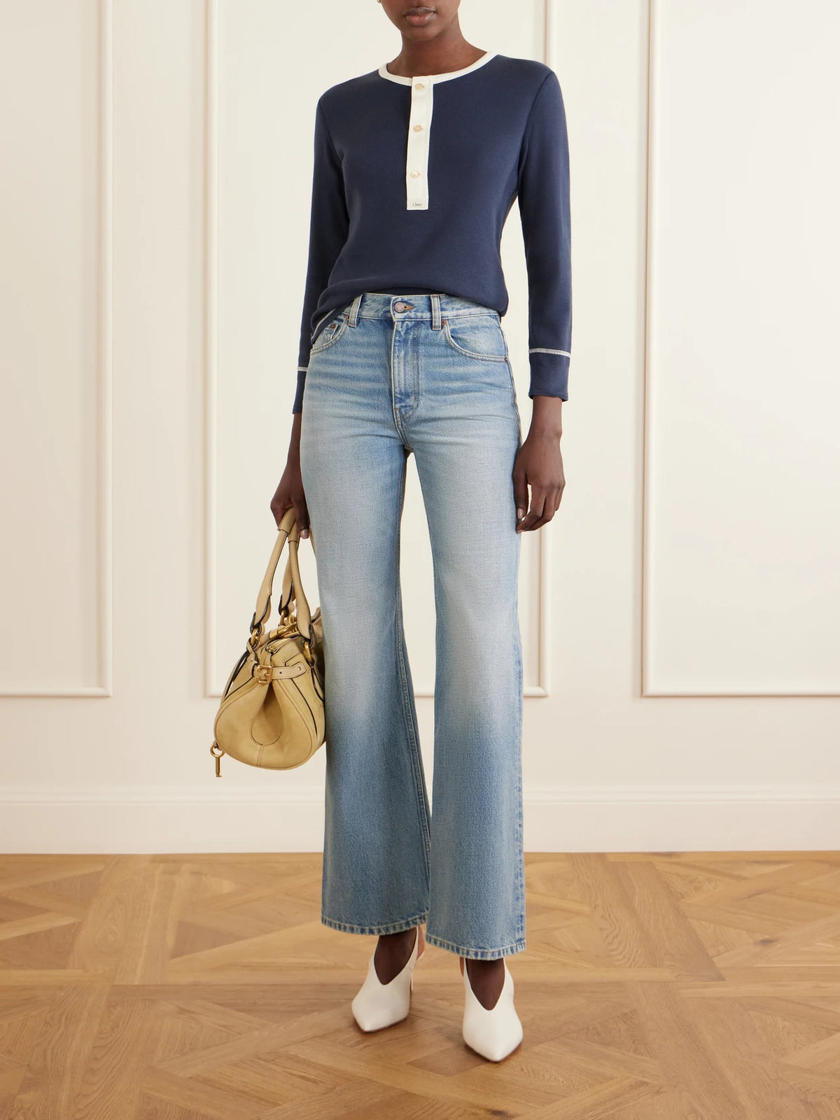 Image of a model wearing Tops. Product name - Ribbed Cotton-jersey Shirt in Navy colour by brand - Chloé