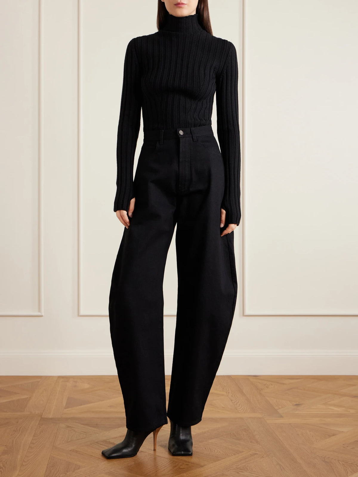 Image of Boots. Product name - 90 Leather Ankle Boots in Black colour by brand - Alaïa