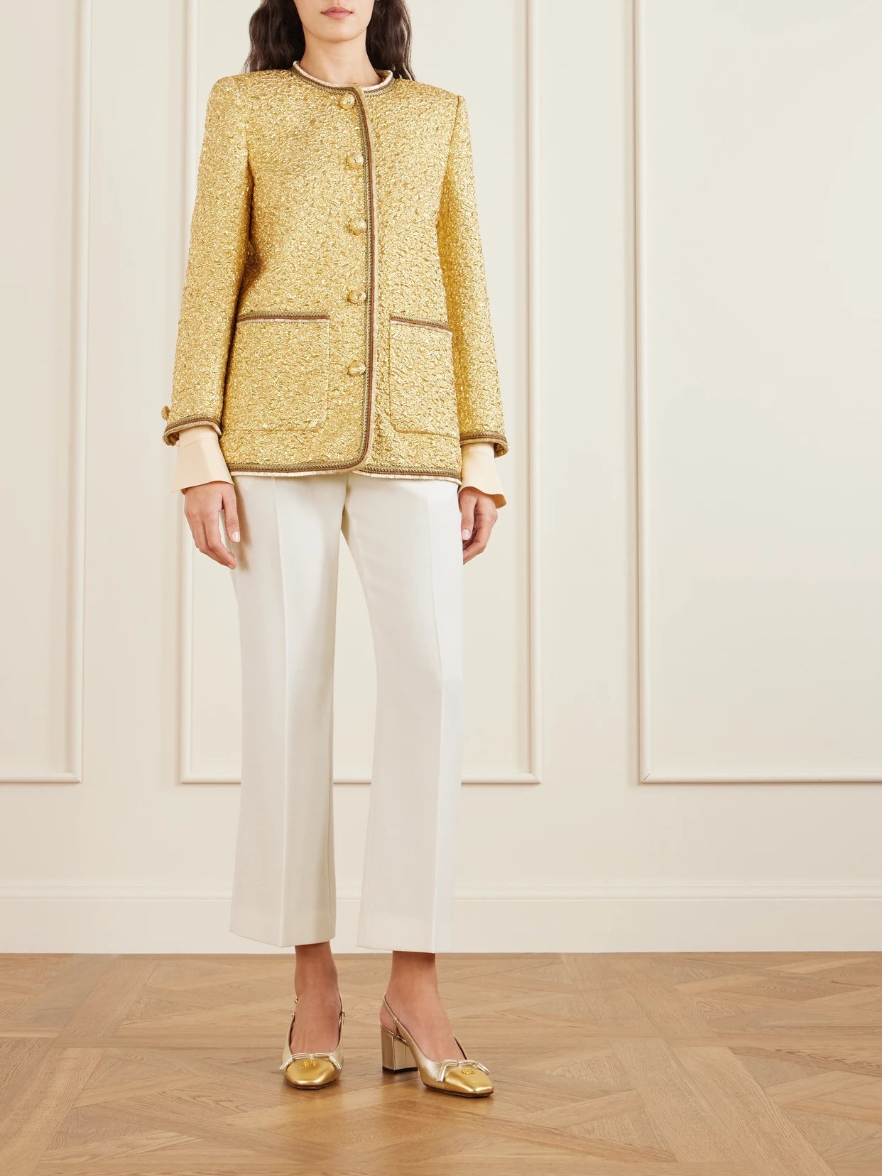 Image of a model wearing Pants. Product name - Embellished Wool Straight-leg Pants in Cream colour by brand - Valentino Garavani