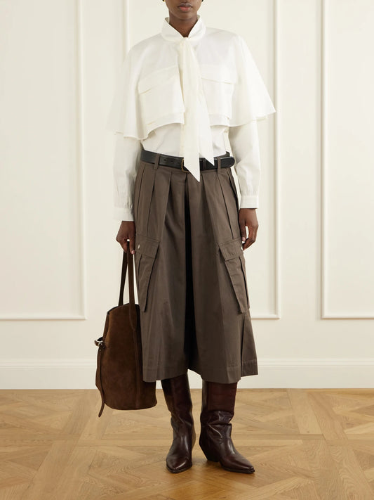 Image of a model wearing Tops. Product name - Tristan Cotton-poplin Blouse in Cream colour by brand - Sea