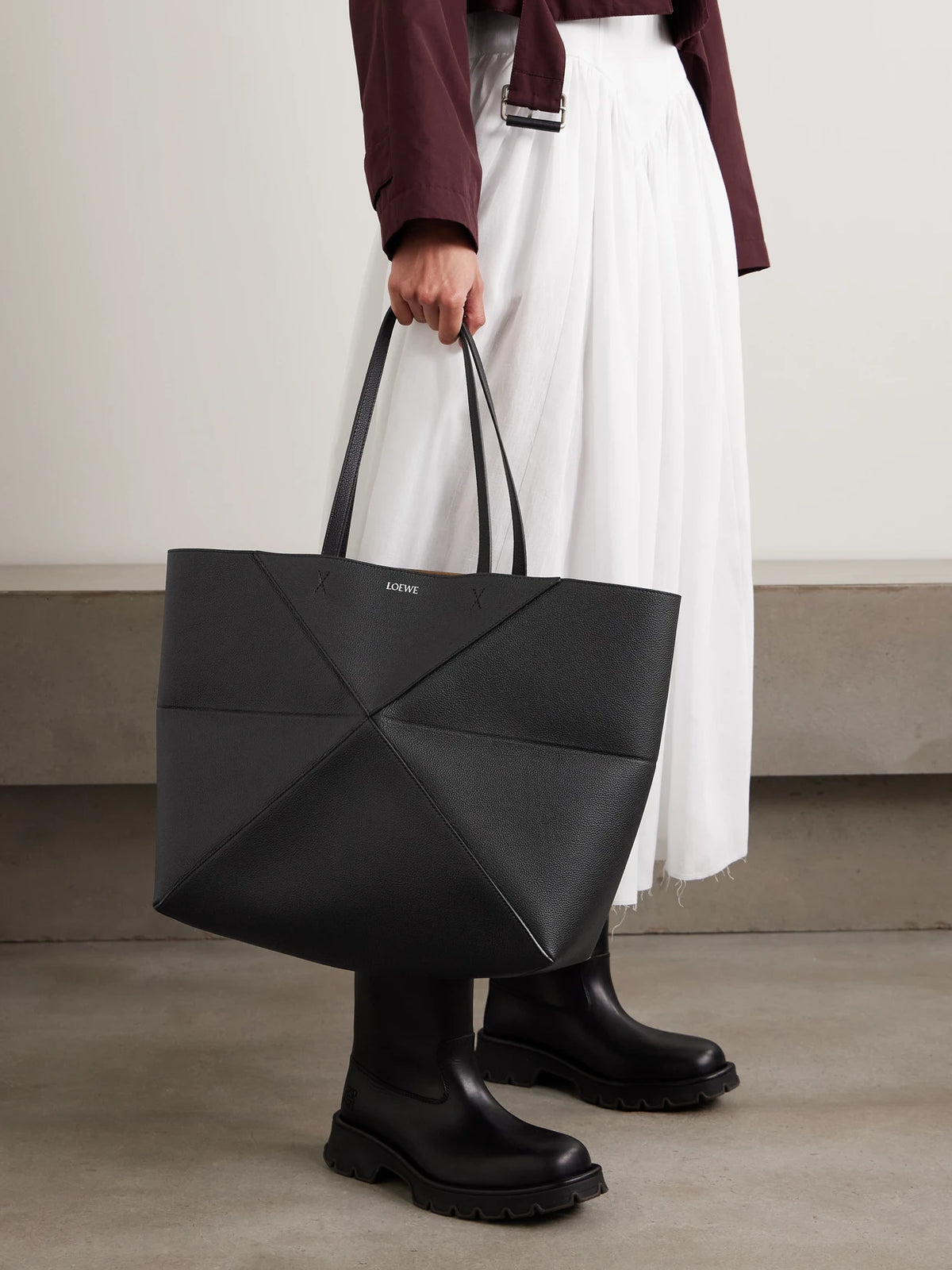 Image of Bags. Product name - Puzzle Fold Horizontal Large Textured-leather Tote in Black colour by brand - LOEWE
