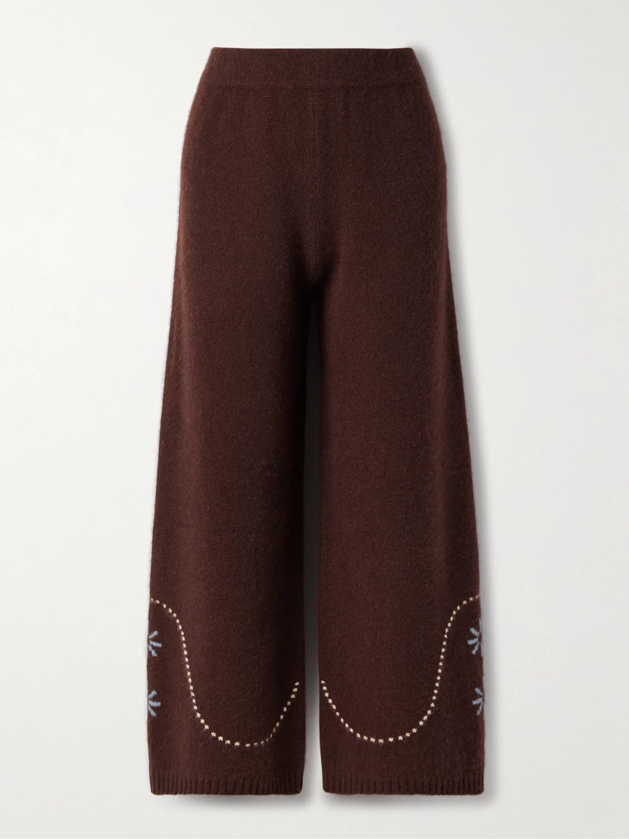 Image of a model wearing Outerwear. Product name - Intarsia-knit Cashmere Wide-leg Pants in Chocolate colour by brand - Calle Del Mar