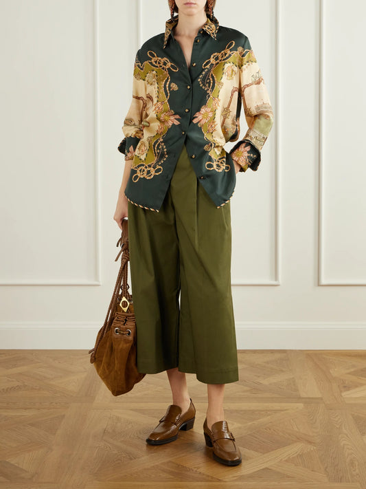 Image of a model wearing Tops. Product name - Valiant Printed Silk-twill Shirt in Brown, Burgundy colour by brand - Zimmermann