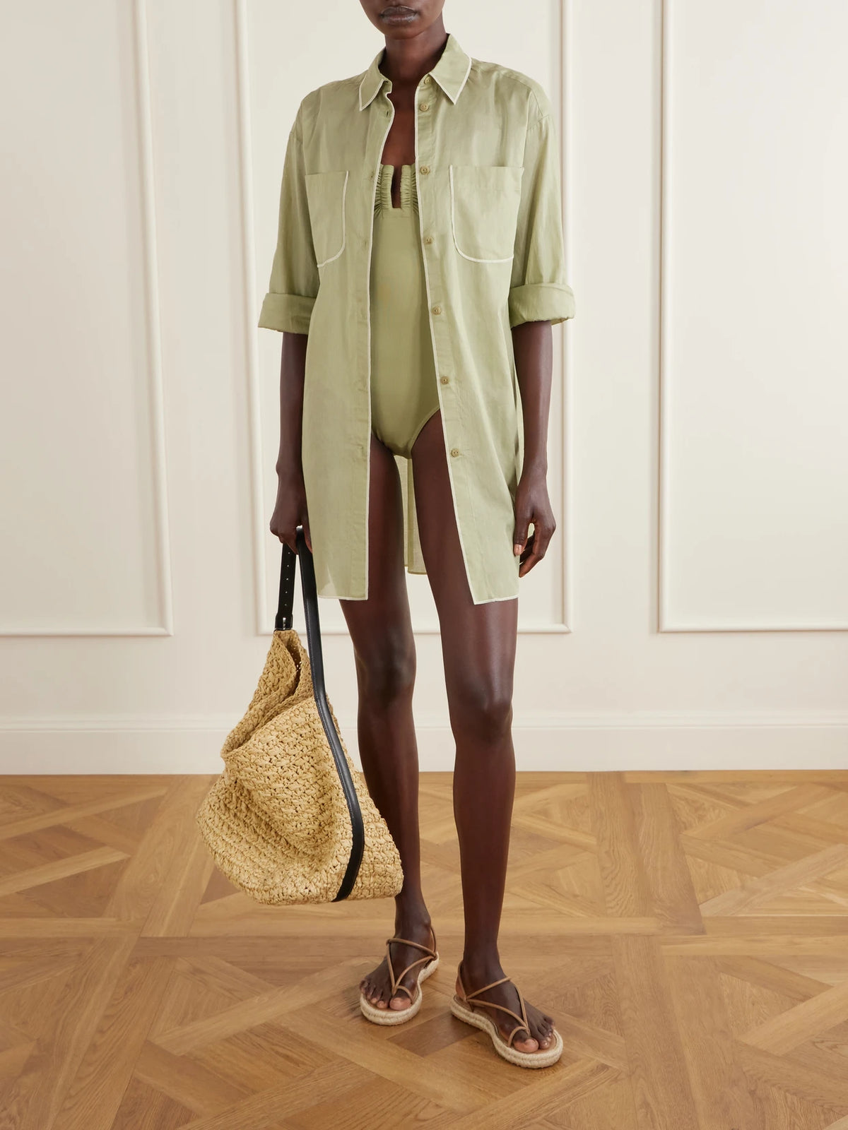 Image of a model wearing Tops. Product name - Phare Cotton Shirt in Green colour by brand - Eres