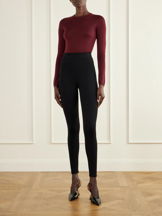 Image of a model wearing Tops. Product name - Wool-jersey Bodysuit in Burgundy colour by brand - Alaïa