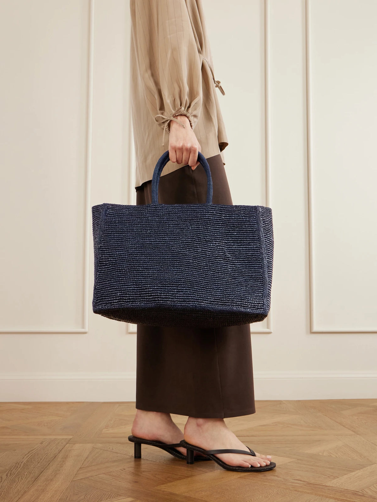 Image of Bags. Product name - The Charlotte Raffia Tote in Navy colour by brand - LIÉ STUDIO