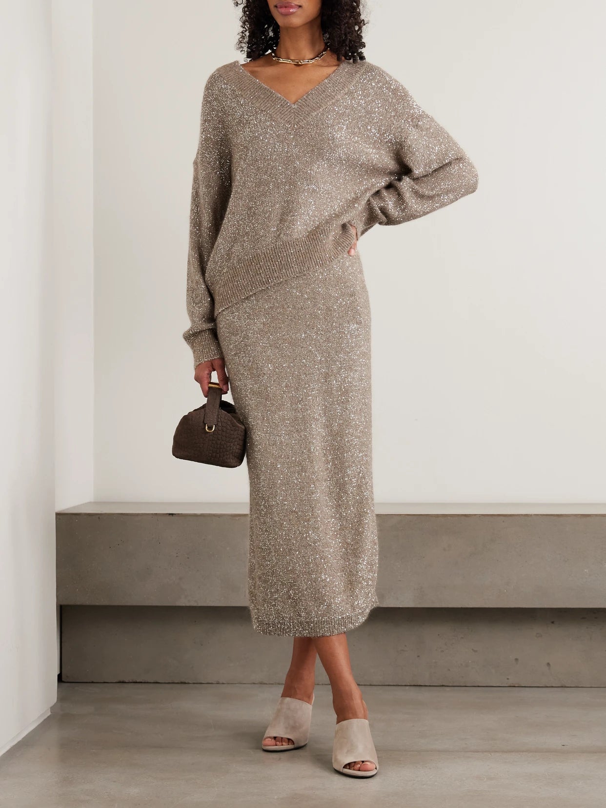 Image of a model wearing Outerwear. Product name - Sequined Knitted Sweater in Light brown colour by brand - Brunello Cucinelli
